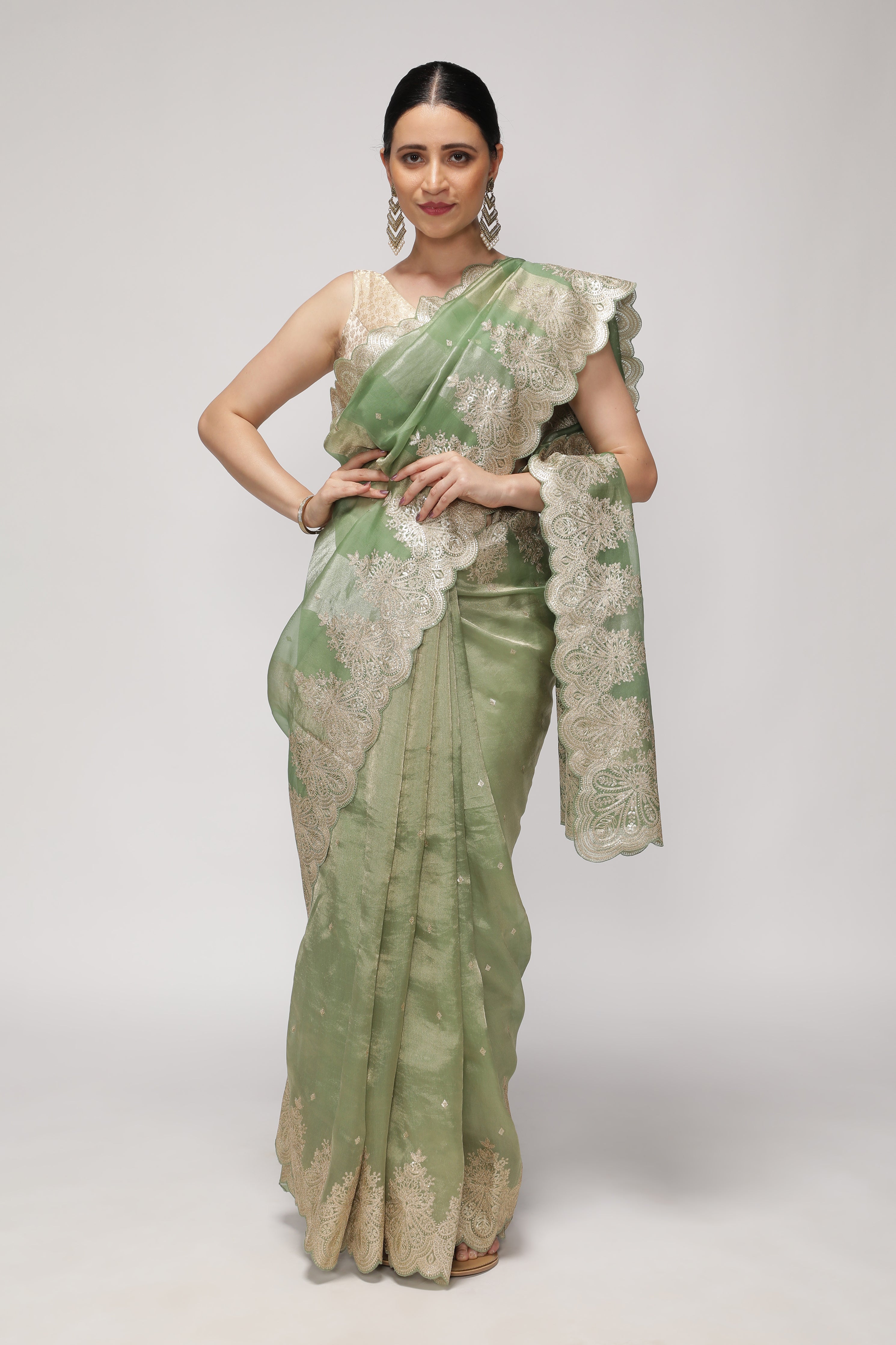 Mint Green Organza Saree with Zari Stripes, Sequins Highlight & Zari-Embroidered Border