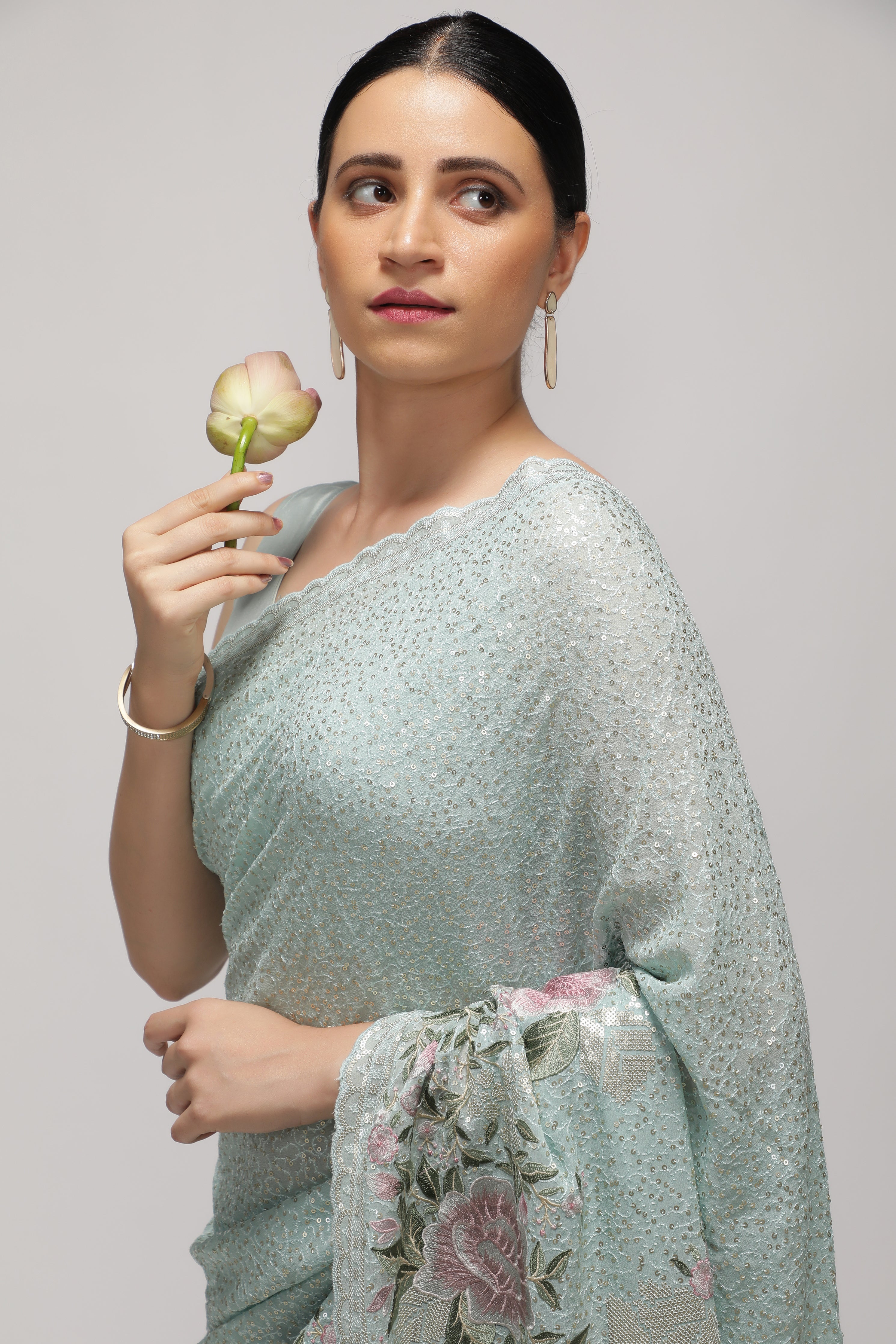 Sea Blue Georgette Saree with All-Over Sequins Body & Embroidered Border