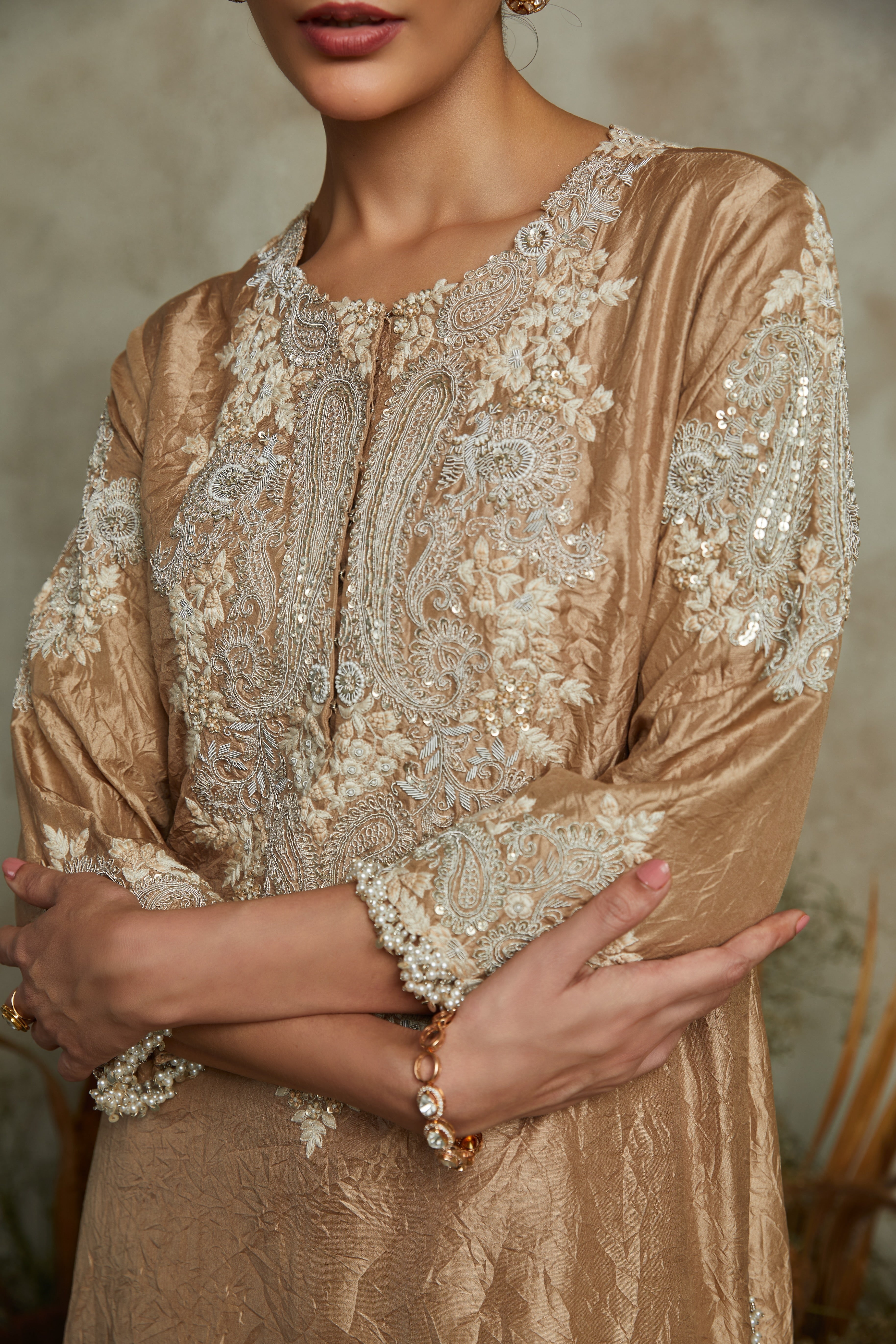 Beige silk crushed kurta with organza dupatta and cotton satin pants  Mokshaa